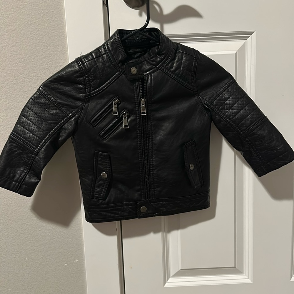 Black leather jacket. Size 2. Washed but never worn.